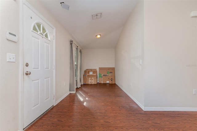 hall with dark hardwood / wood-style floors