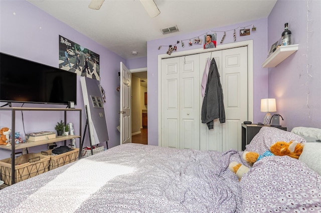 bedroom with a closet and ceiling fan