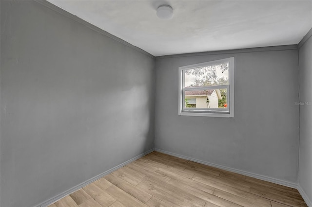 spare room with light wood-type flooring