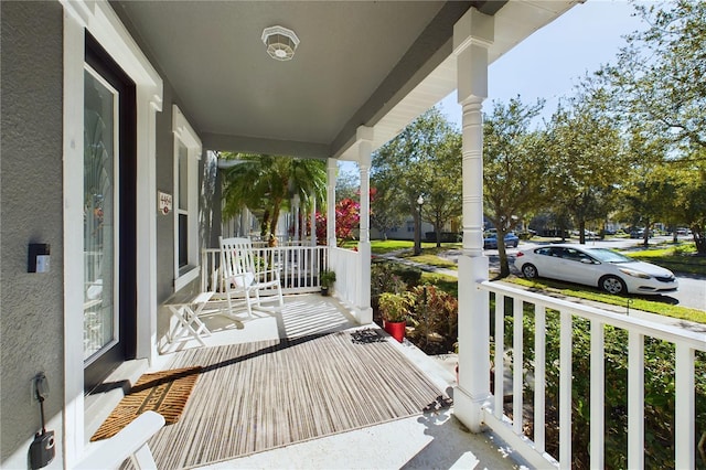 wooden deck featuring a porch