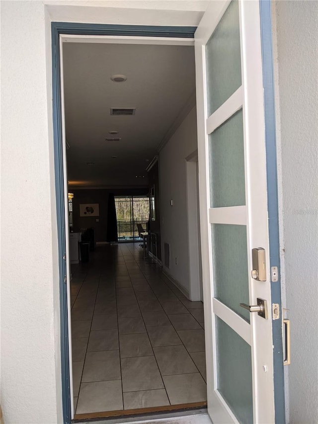 corridor with tile patterned floors