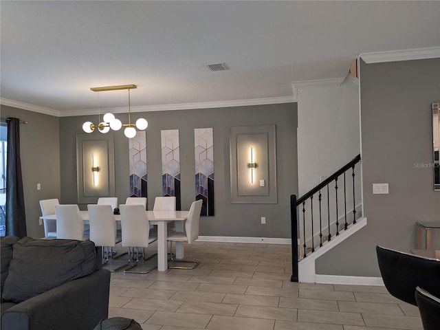 dining space with crown molding and a chandelier