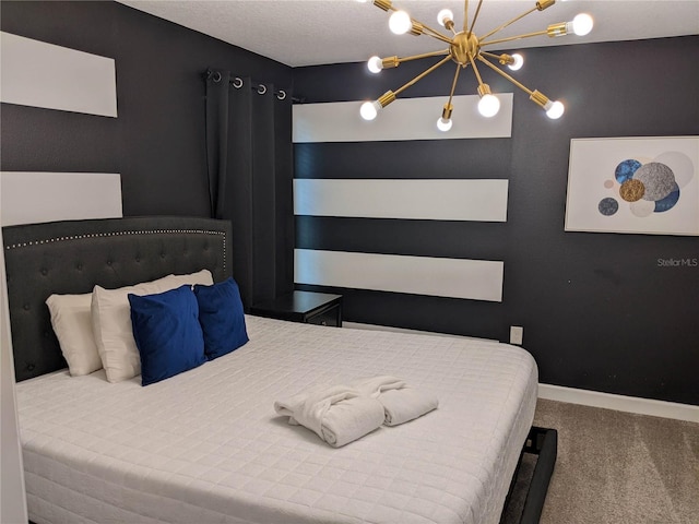 bedroom with carpet and a notable chandelier