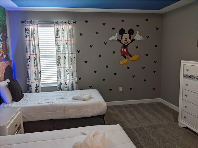 carpeted bedroom with multiple windows