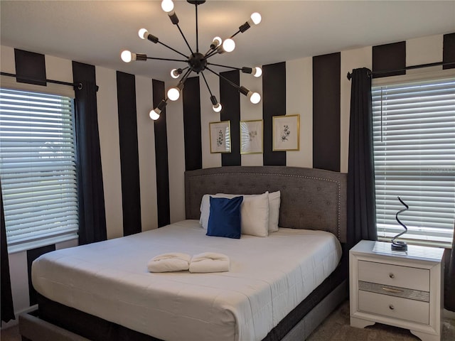 bedroom with an inviting chandelier