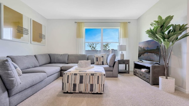 living room featuring light carpet