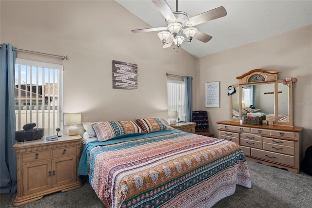 carpeted bedroom featuring vaulted ceiling and ceiling fan