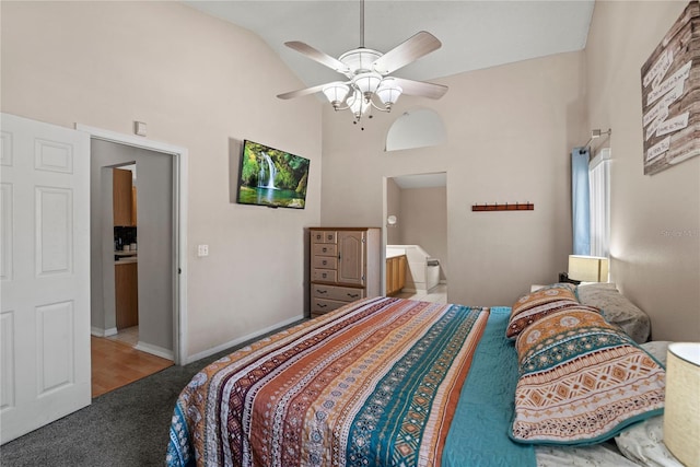carpeted bedroom featuring ceiling fan and high vaulted ceiling