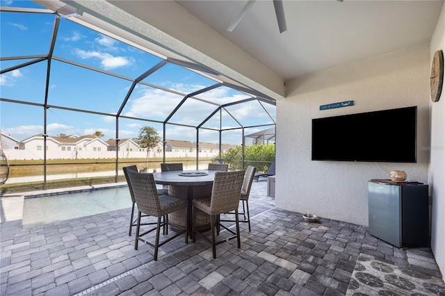 view of patio / terrace featuring a lanai