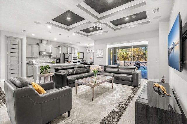 tiled living room with coffered ceiling