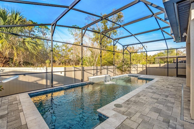 view of pool featuring a lanai and a patio area