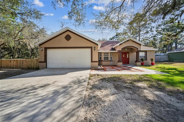 ranch-style house featuring a garage