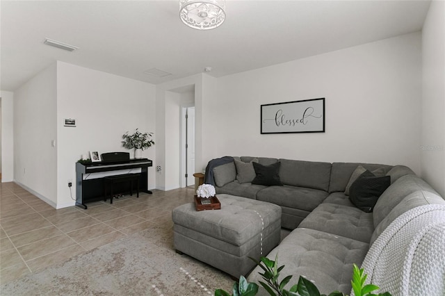 living room with light tile patterned floors