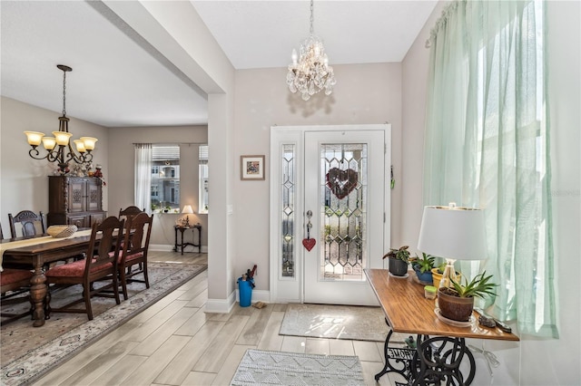 entrance foyer featuring a chandelier