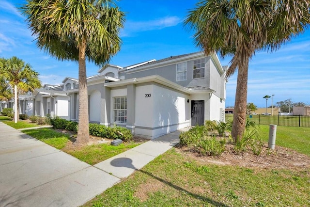 view of front of house with a front lawn