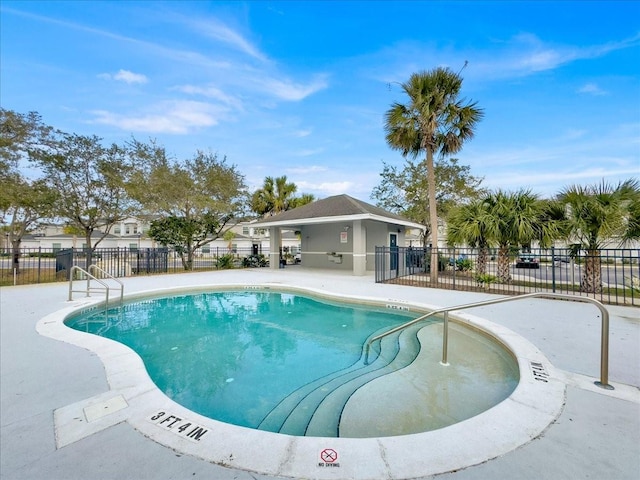 view of swimming pool with a patio