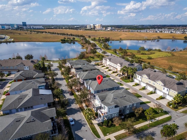 drone / aerial view featuring a water view