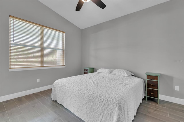 bedroom featuring ceiling fan and vaulted ceiling