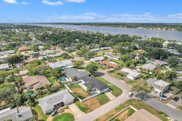 drone / aerial view featuring a water view