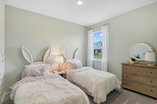 bedroom featuring carpet