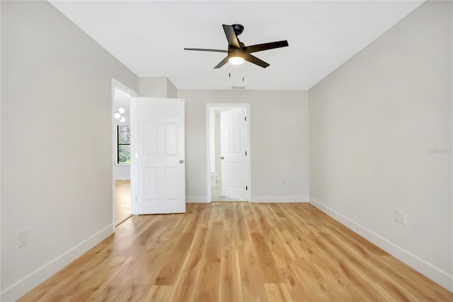 empty room featuring light hardwood / wood-style floors and ceiling fan