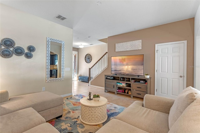 living room featuring light tile patterned flooring