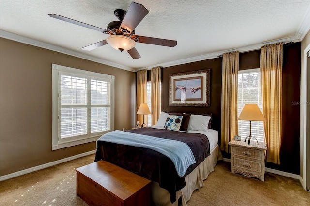 bedroom with light carpet, ceiling fan, ornamental molding, and a textured ceiling