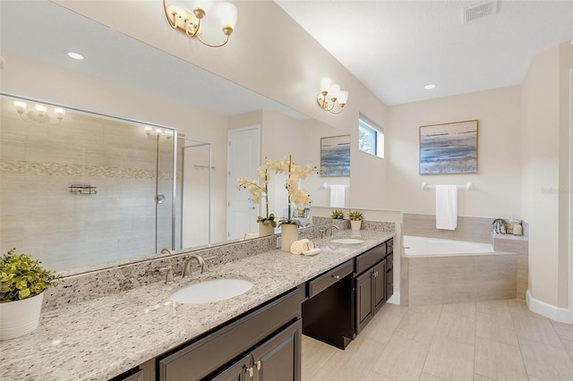 bathroom featuring vanity, shower with separate bathtub, and tile patterned floors