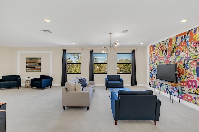 living room featuring light colored carpet and a chandelier