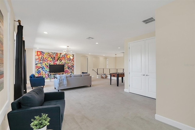 living room featuring light colored carpet