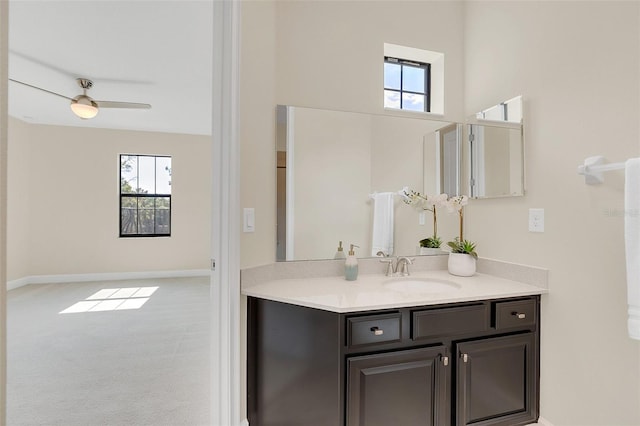 bathroom with vanity, plenty of natural light, and ceiling fan