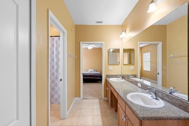 bathroom featuring vanity and tile patterned floors