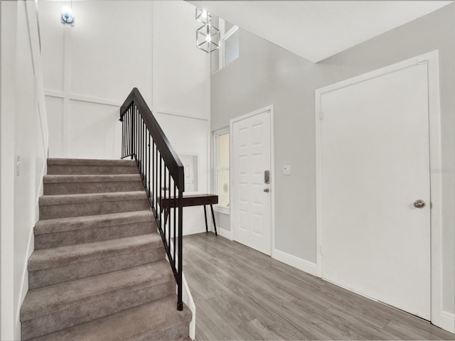 foyer entrance with hardwood / wood-style flooring