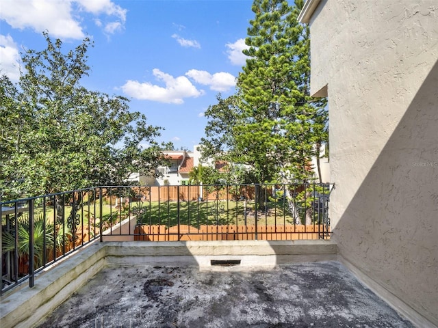 view of patio with a balcony