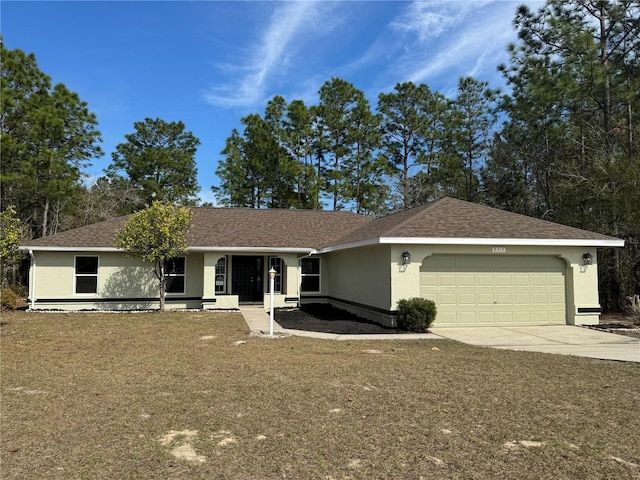 single story home featuring a garage and a front lawn