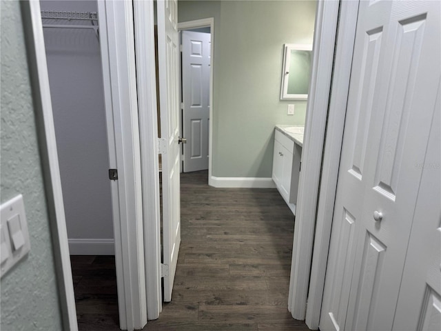 bathroom with wood-type flooring and vanity