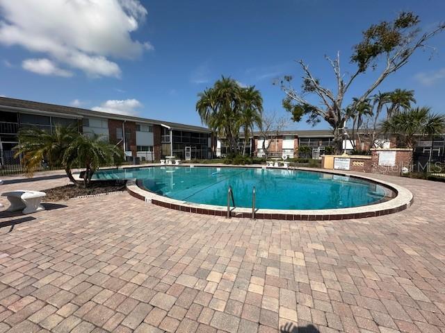 view of pool featuring a patio