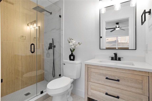 bathroom featuring vanity, toilet, and walk in shower