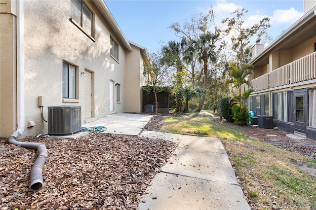 view of yard with a patio and cooling unit