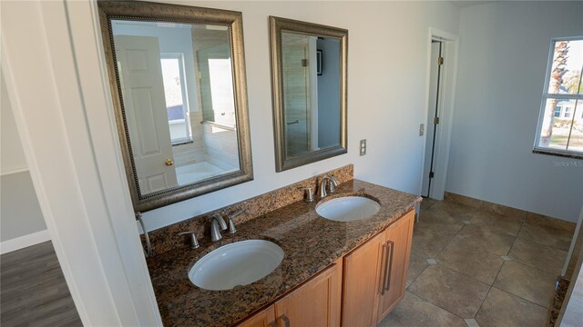 bathroom featuring vanity and tile patterned floors