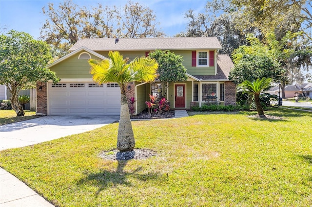 view of front of property with a garage and a front yard