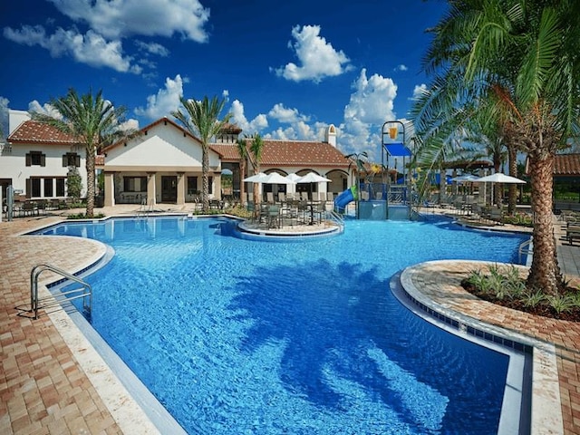 view of pool with a patio