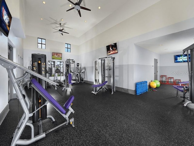 exercise room with ceiling fan