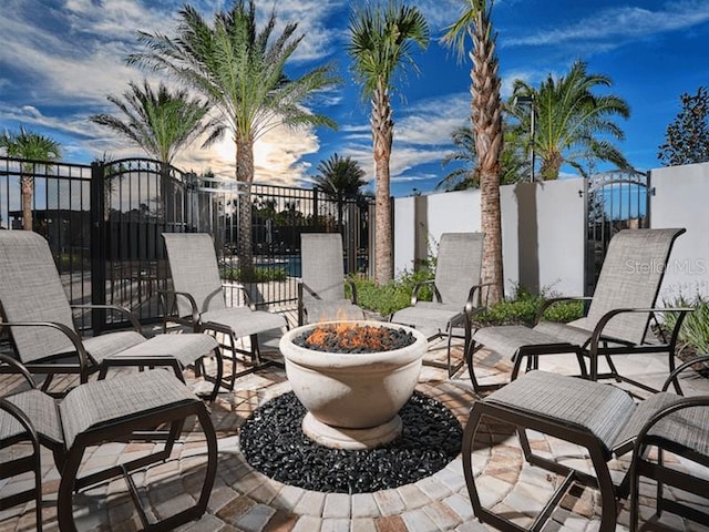 view of patio / terrace with an outdoor fire pit