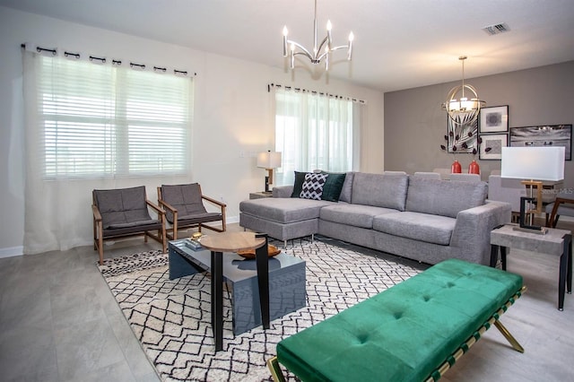 living room with a notable chandelier