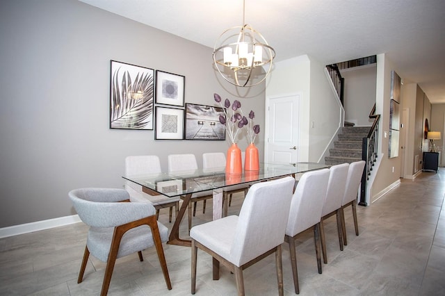 dining space featuring a chandelier