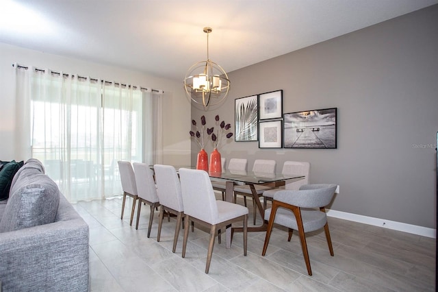 dining room with a notable chandelier