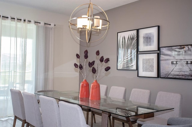 dining space featuring plenty of natural light and a chandelier