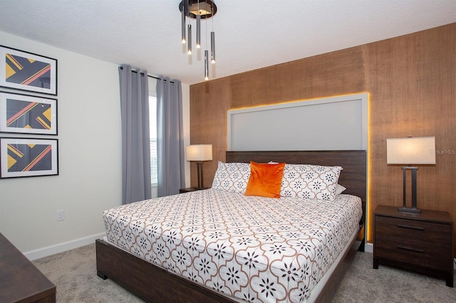 bedroom featuring light carpet