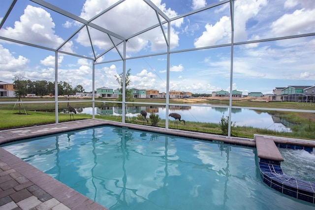 view of pool featuring a lanai and a water view